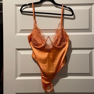 Orange corset bodysuit